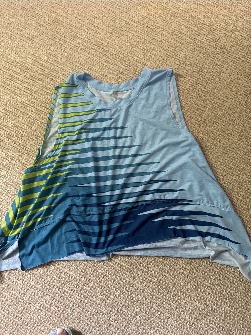 FP Movement tempo tank in graphic blue and yellow.